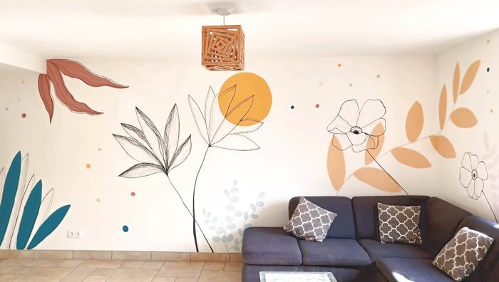 Fresque murale feuillages et soleil salon